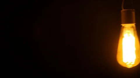 Swinging Light Bulb Stock Footage 109186698