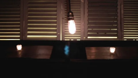 SWINGING LIGHTBULB Video stock 99365799