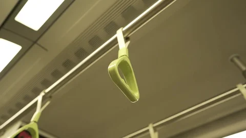 Swinging passenger handles on Train Stock Footage 113550626