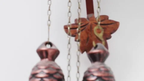 The Swinging Pendulum on a Swiss Cuckoo Clock Stock Footage 130938408