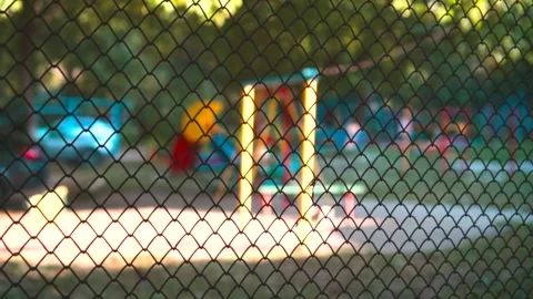 Swinging playground through the net Stock Footage 142381441