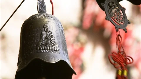 Swinging prayer bell at Buddhist monastery Stock Footage 88334404