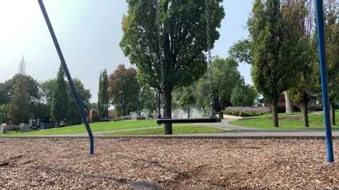 Swinging Seat Push by Wind Stock Footage 139363885