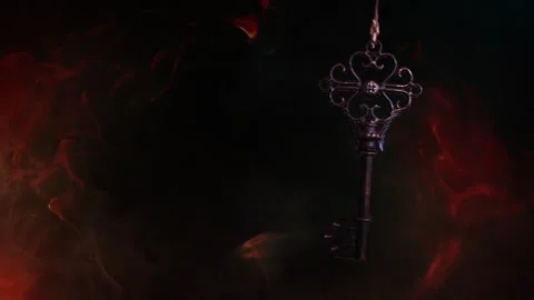 Swinging Skeleton Key in Dark Smoke 4K Loop Stock Footage 312651242