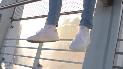 Swinging sneakers Stock Footage 169296579