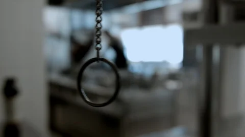 Swinging String Of A Bell In The Kitchen To Summon The Waiters / Servers Stock Footage 95151355