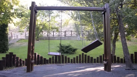 Swinging swings Stock Footage 137338962