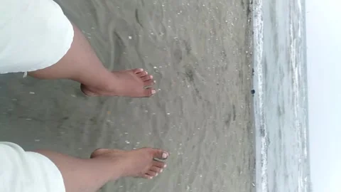 Swinging while watching the beautiful beach Stock Footage 240467835