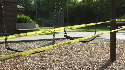 Swings with caution tape Stock Footage 165301623