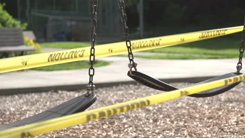 Swings with caution tape Video stock 165301707