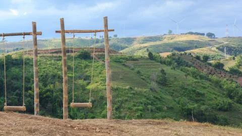 Swings on the mountain. Stock Photos