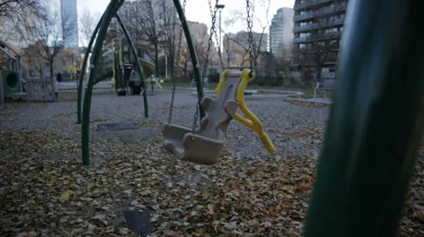 Swings in the playground Видео 34028086