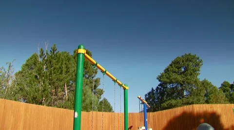 Swings in playground Video stock 54592984