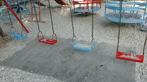 Swings at playground Stock Footage 103354409