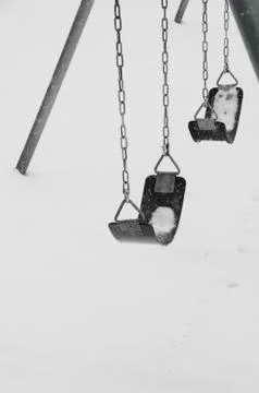Swingset in cold Stock Photos