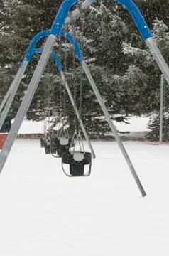 Swingset in cold Stock Photos