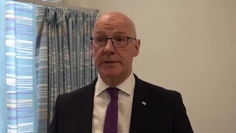 Swinney pledges 'significant measures' to tackle violence against women and gir Video stock 343642323