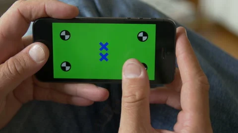 Swipe Cell Phone, touch screen, held by hands. Chroma Key. Close up. 4K Stock Footage 42240799