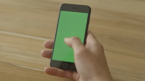 Swipe on a Smart Phone, Touch Screen, Held By Hands. Chroma Key. Close Up. Stock Footage 95774949