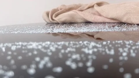 Swiping sugar on a table with a tissue Stock Footage 146255291