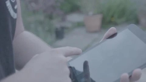 Swiping on a tablet 動画素材 78561173