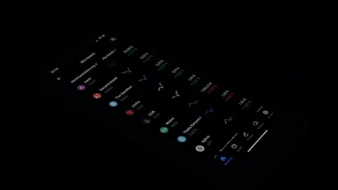 Swiping through crypto wallet on phone in dark Stock Footage 219656874