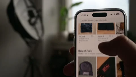 Swiping in the Vinted app Stock Footage 258267952