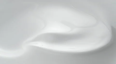 Swirl in milky liquid surface. Slow Motion. Stock Footage