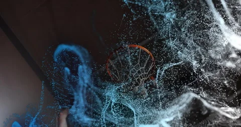 Swirling blue and white particles coiling into orange basketball rim and net, Stock Footage 314334602