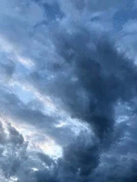 Swirling Blue Gray Storm Clouds Stock Photos