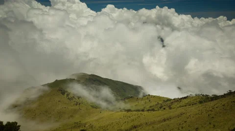 Swirling cloud envelops the summit of Mount Merapi, Indonesia Stock Footage 45348579