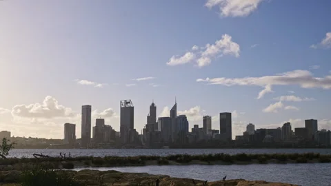Swirling clouds sweep over Perth City. Island, river in foreground - timelapse Stock Footage 279286563