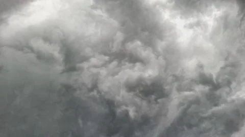 Swirling Dark Thunderstorm Clouds in the Sky Stock Photos