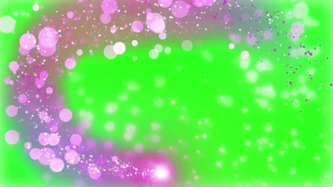 Swirling pink light particles flowing across vibrant green screen background 動画素材 340613007