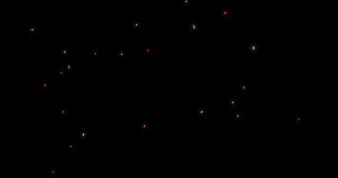 Swirling red and orange particles on black background 10 Stock Footage 263316628