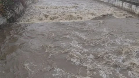 Swirling river in December. Sasar River in Baia Mare city, Romania Stock Footage 227735942