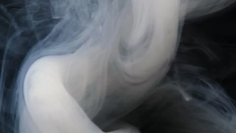 Swirling smoke creates captivating patterns under subtle lighting. Stock Footage 274137737