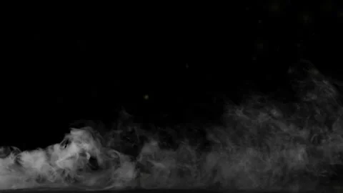 Swirling smoke rolling low across the ground. Black screen smoke effect. Stock Footage 322570394