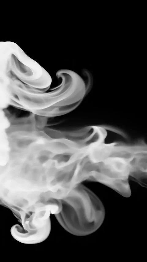 Swirling white smoke creating dynamic abstract shapes against dark backdrop Stock Footage 310597381