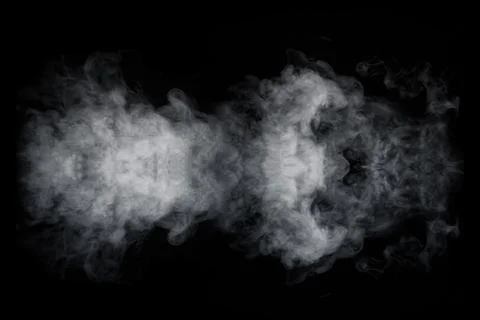 Swirling wriggling smoke steam isolated on a black background for