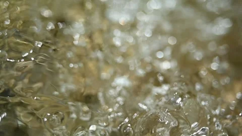 Swirls and bubbles on a mountain stream (bokeh, slow motion) Stock-Footage 219640191