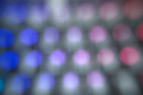   swirly  colorful rounded lights pattern  on black   Stock Photos