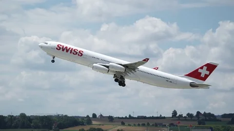 SWISS Airbus A340 "Jumbojet" Passenger Airplane Take Off and Flyby at Airport Stock Footage 84075940