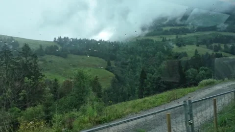 Swiss Alps Landscape Viewed from a Moving Train Stock Footage 328129596