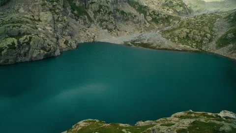 Swiss Alps Mountain Captured in Bright Daylight with Iconic Sharp Sum Stock Footage 316049694