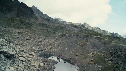 Swiss Alps Mountain Captured in Bright Daylight with Iconic Sharp Sum Stock Footage 316049835