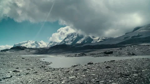 Swiss Alps Mountain Captured in Bright Daylight with Iconic Sharp Sum Stock Footage 316050425