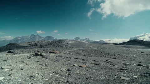 Swiss Alps Mountain Captured in Bright Daylight with Iconic Sharp Sum Stock Footage 316050660