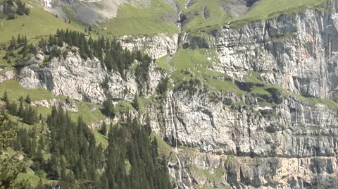 Swiss Alps - mountain stream flows into the lake. Stock-Footage 32213973