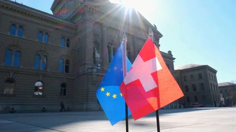 Swiss and EU flags at Bundesplatz, Bern parliament square Stock-Footage 318710676